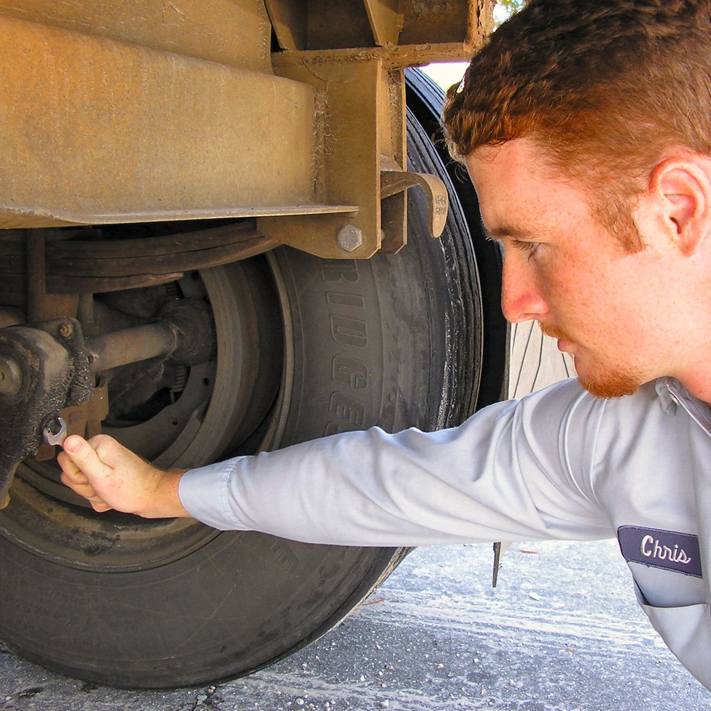 Mechanic working on a commercial truck